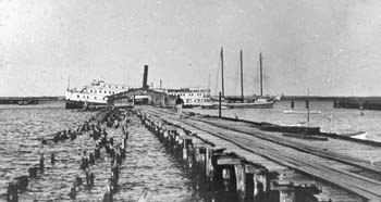 man-walking-on-dock
